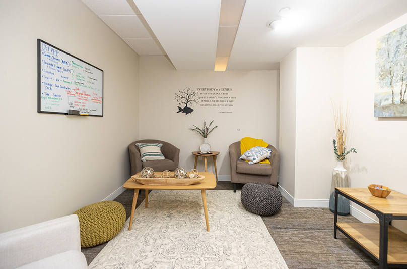 Therapy office with two chairs and a small table