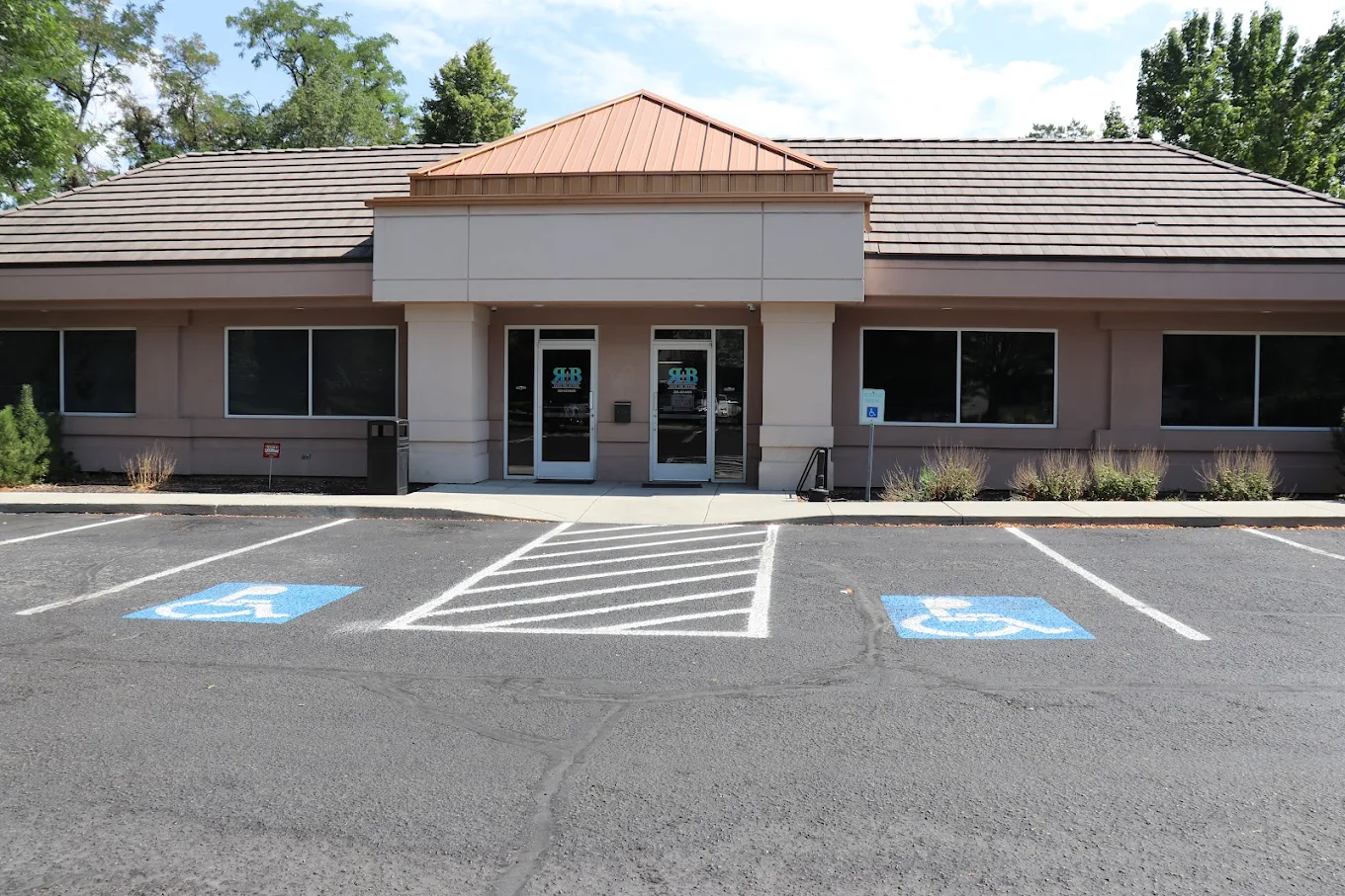 Single-story building with parking and accessible spaces