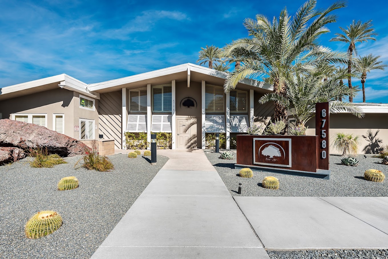 Rehab center entrance with desert landscaping