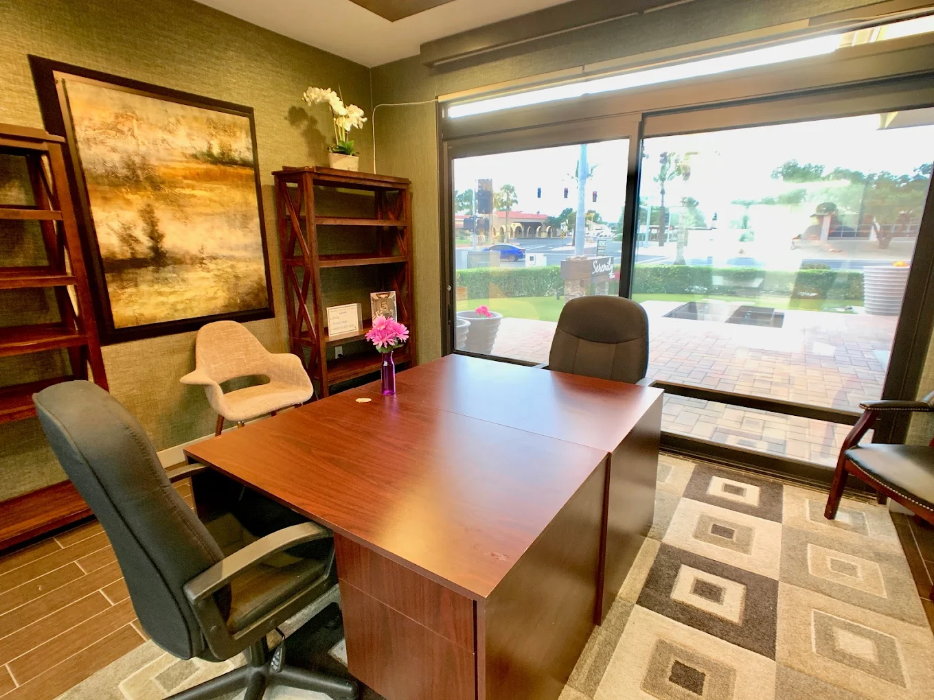 Private counseling room with desk and seating