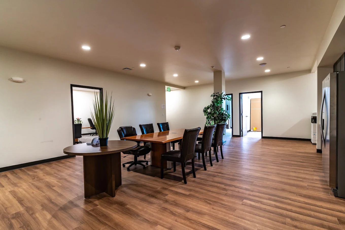 Conference table with chairs in therapy meeting room