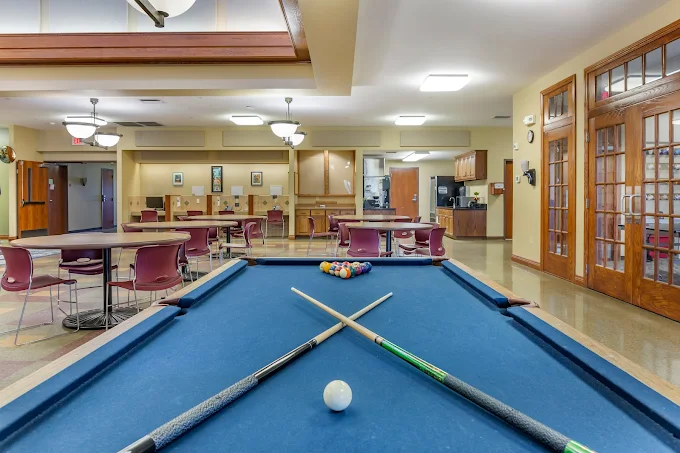 Pool table in recreation and dining area