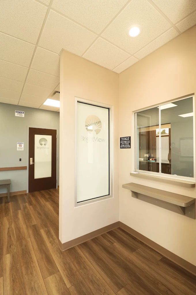 Reception desk in bright, modern treatment center.
