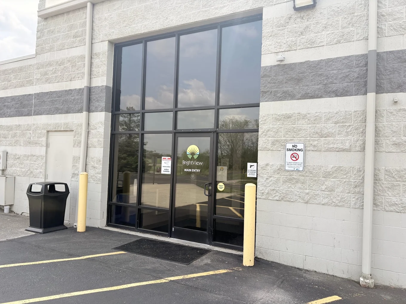 Glass main entrance to the BrightView Mason facility