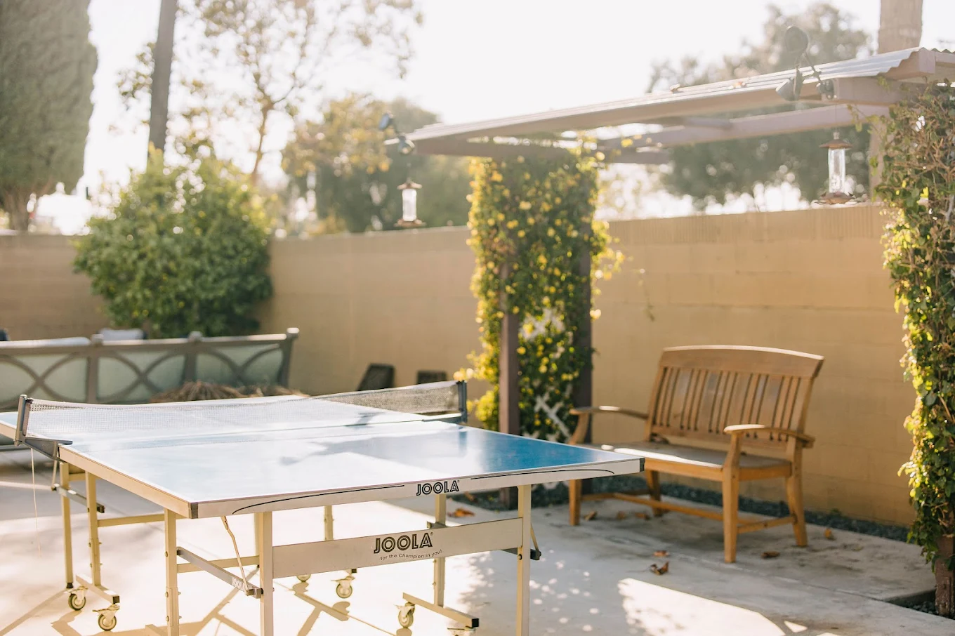 Ping pong table on sunny outdoor patio