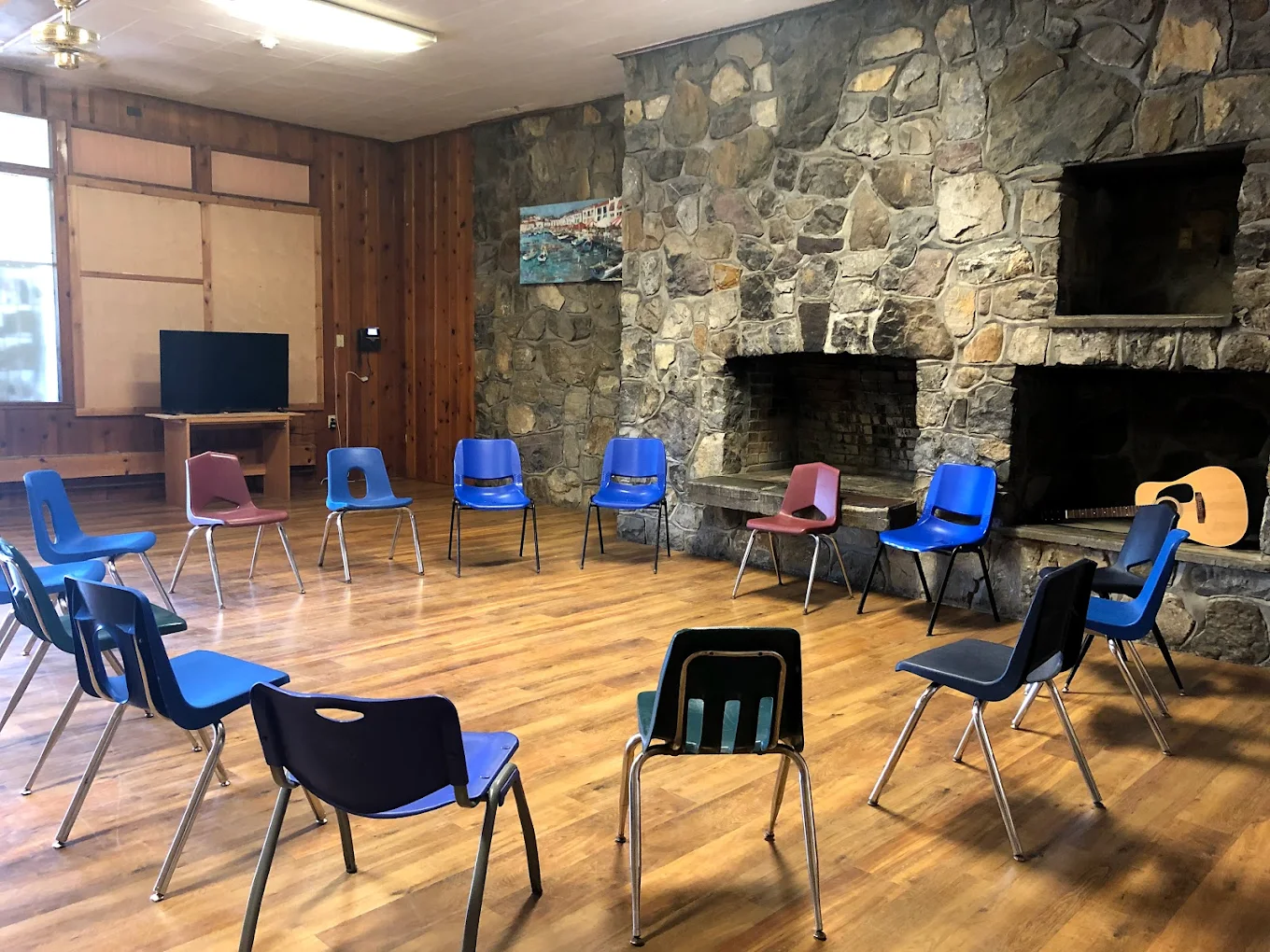Group therapy room with chairs arranged in a circle