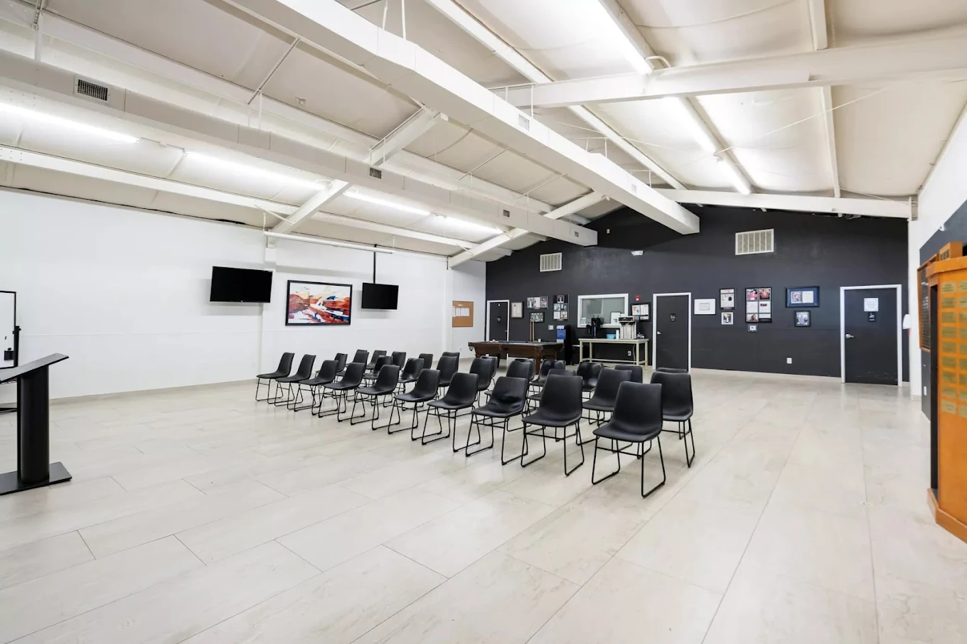 Large meeting room with seating for group therapy sessions