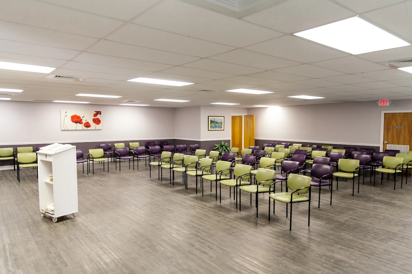 Group therapy room with rows of chairs