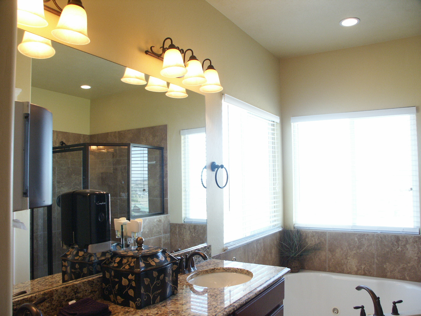 Clean bathroom with soaking tub and walk-in shower