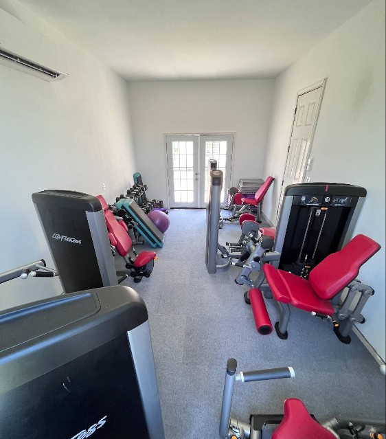 Fitness room with strength training equipment