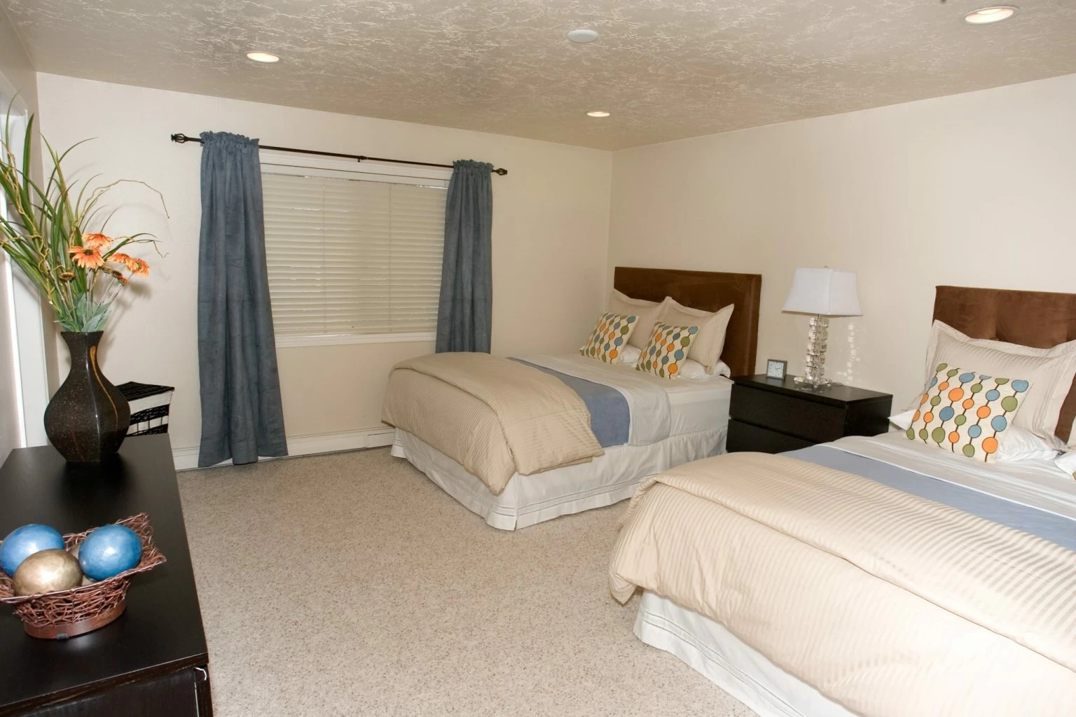 Shared bedroom with two beds and modern furnishings