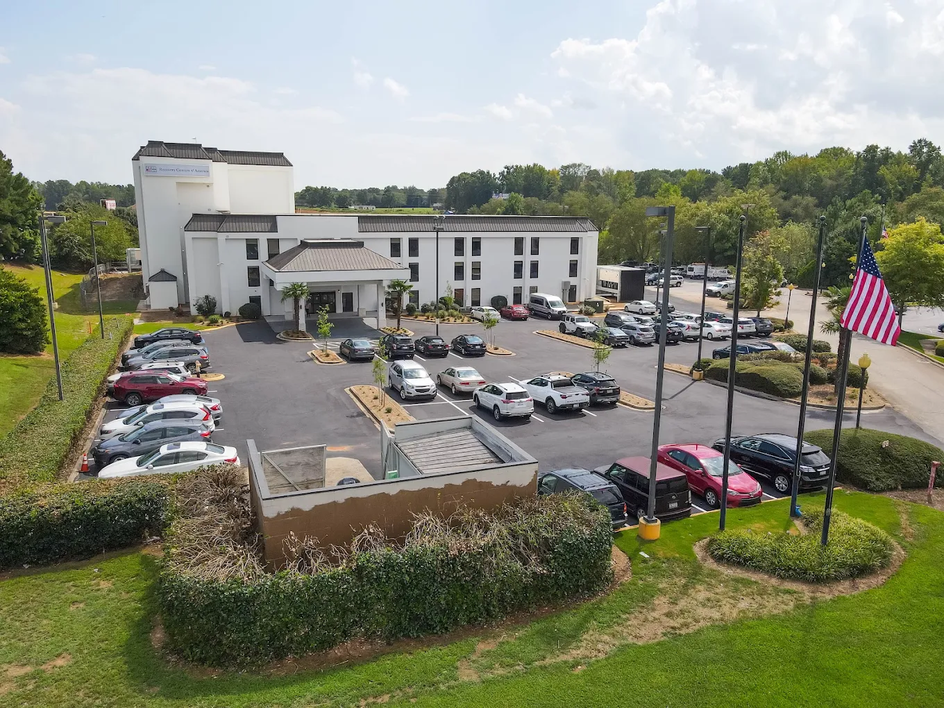 America at GreenvilleAerial view of facility exterior, parking lot, and grounds