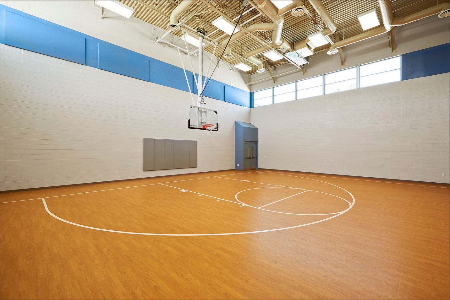  Full-size indoor basketball court with high ceiling