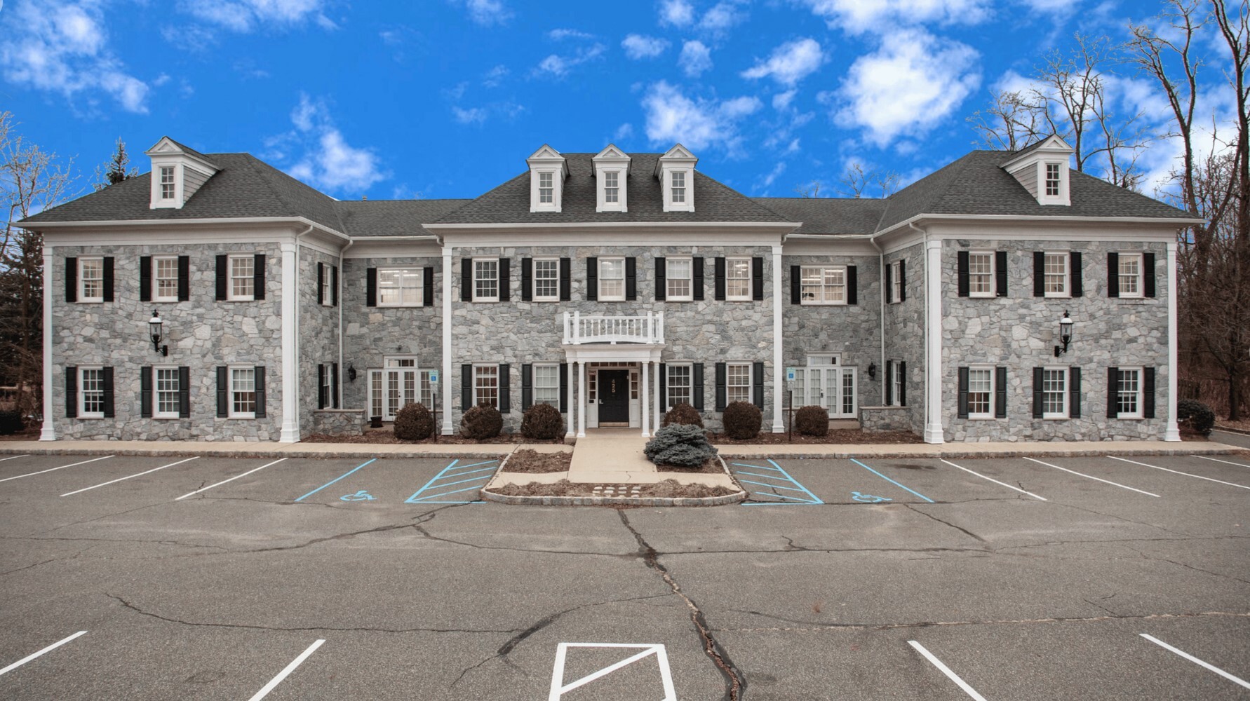 Main building entrance at rolling hills with accessible parking