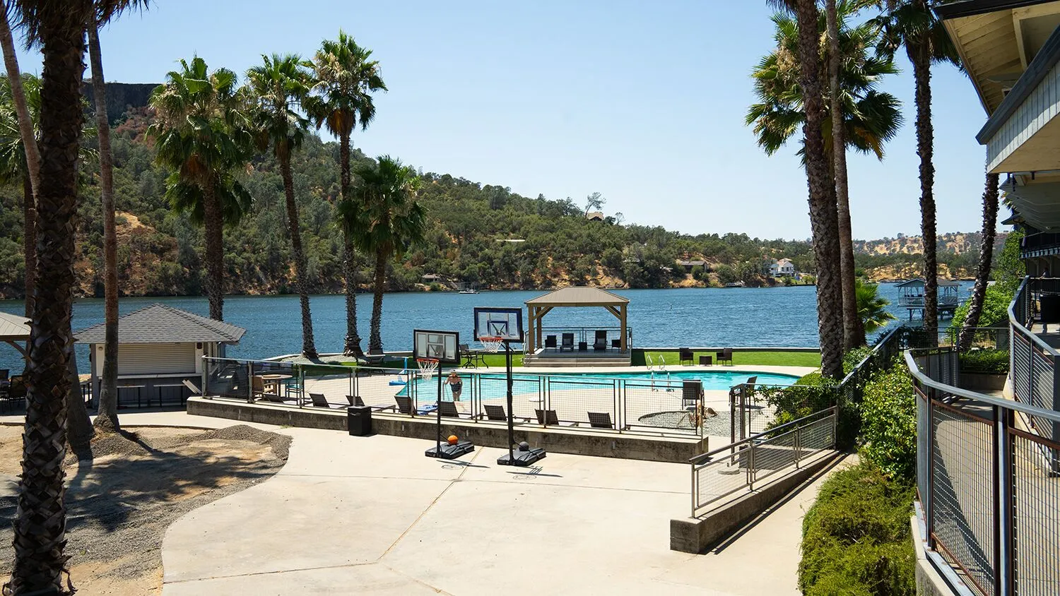 Outdoor basketball court by the lake at The Lakes Treatment Center