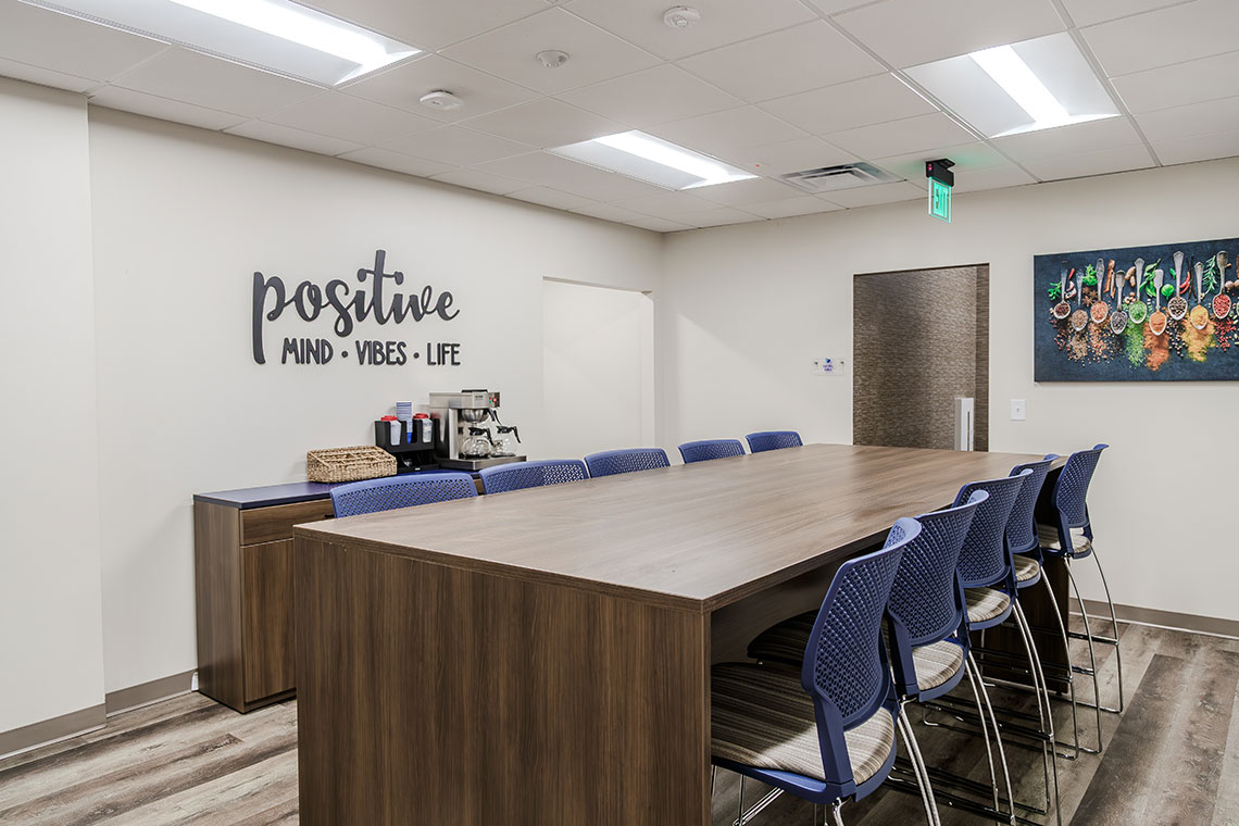 Conference room with long table and seating
