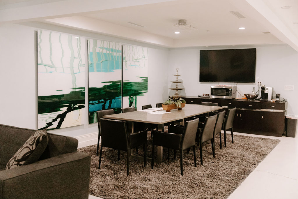 Modern dining area with long table and chairs