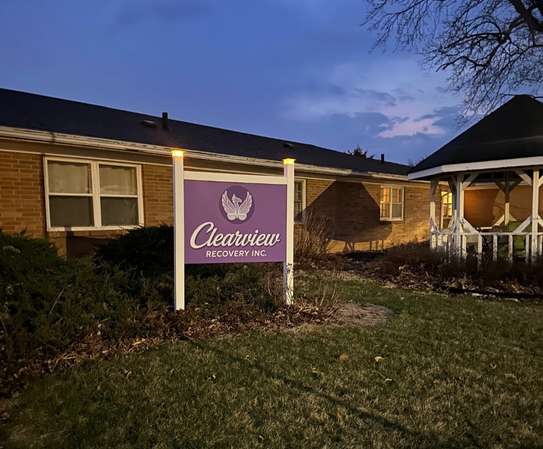 Signage in front of building for earview Recovery Inc.