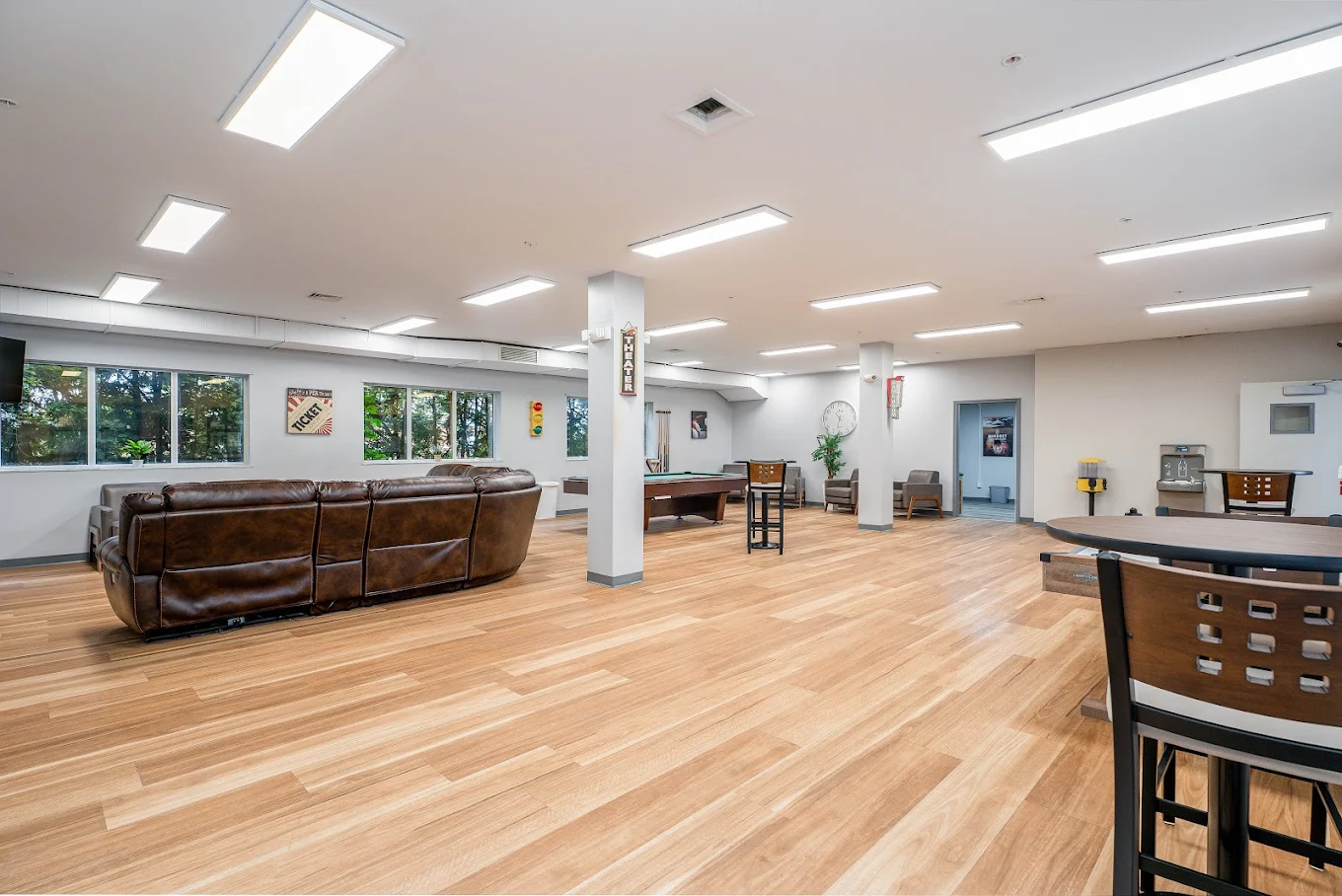 Large recreation lounge with pool table and seating