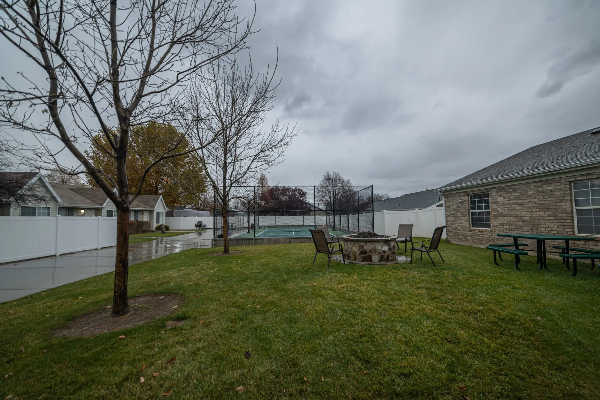 Outdoor courtyard with seating and fire pit