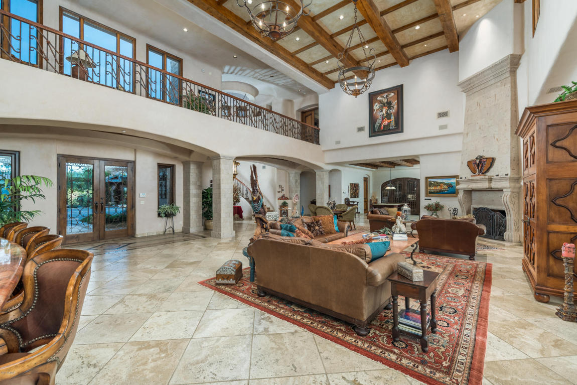 Spacious living area with rustic decor.