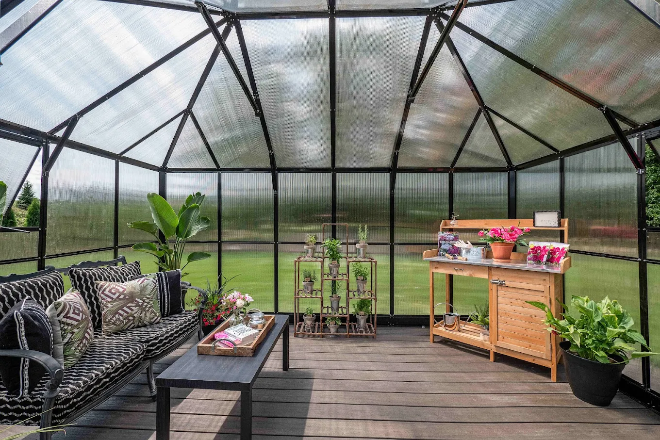 Indoor greenhouse with couch and potted plants