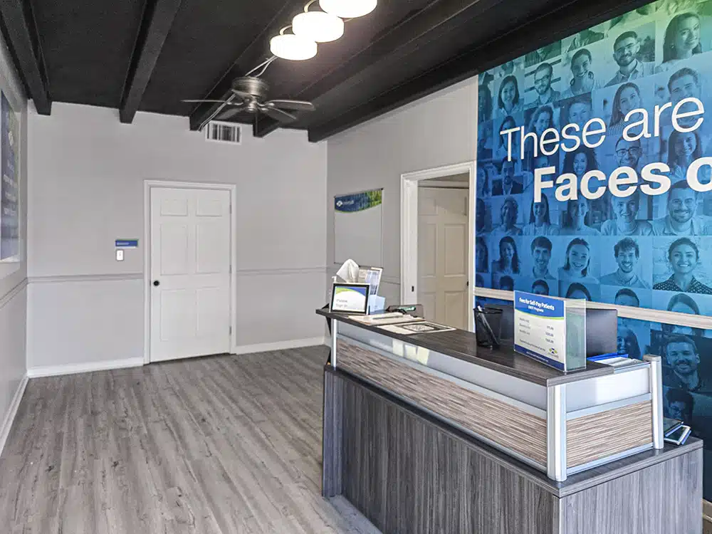 Front desk with modern design and recovery mural wall