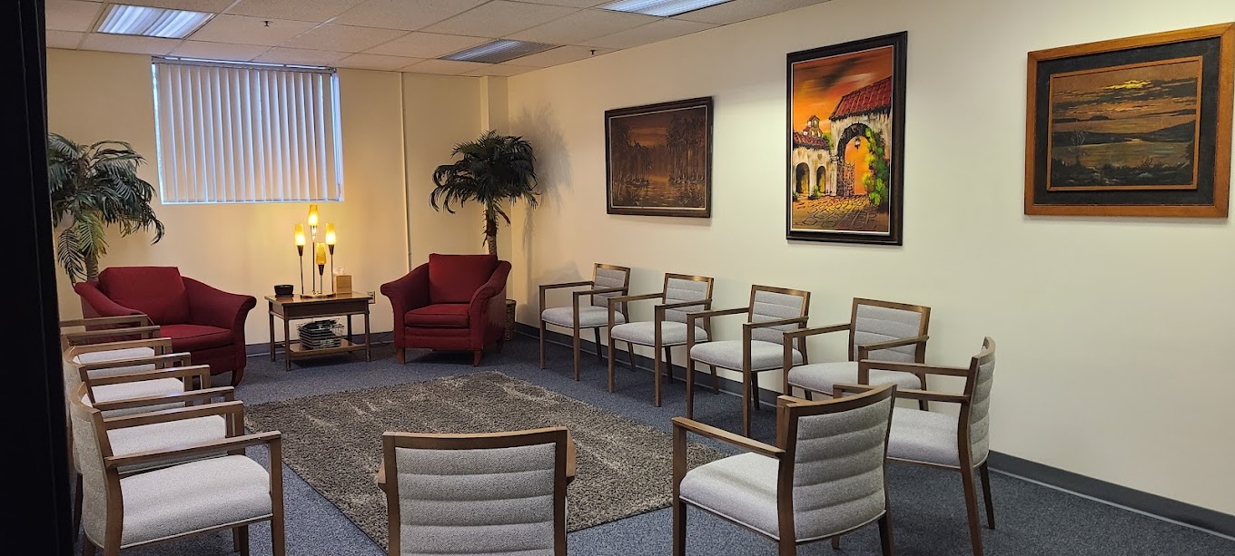Group therapy room with chairs in a circle.