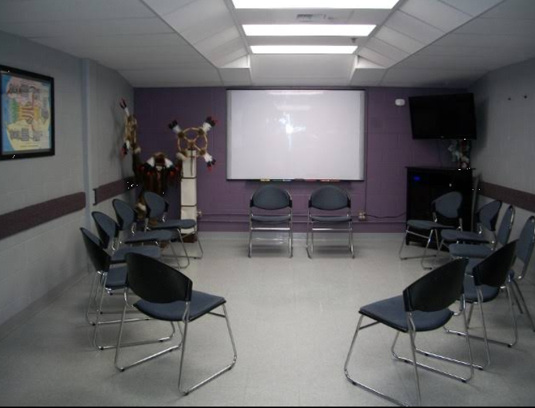 Circle of chairs in a therapy meeting room
