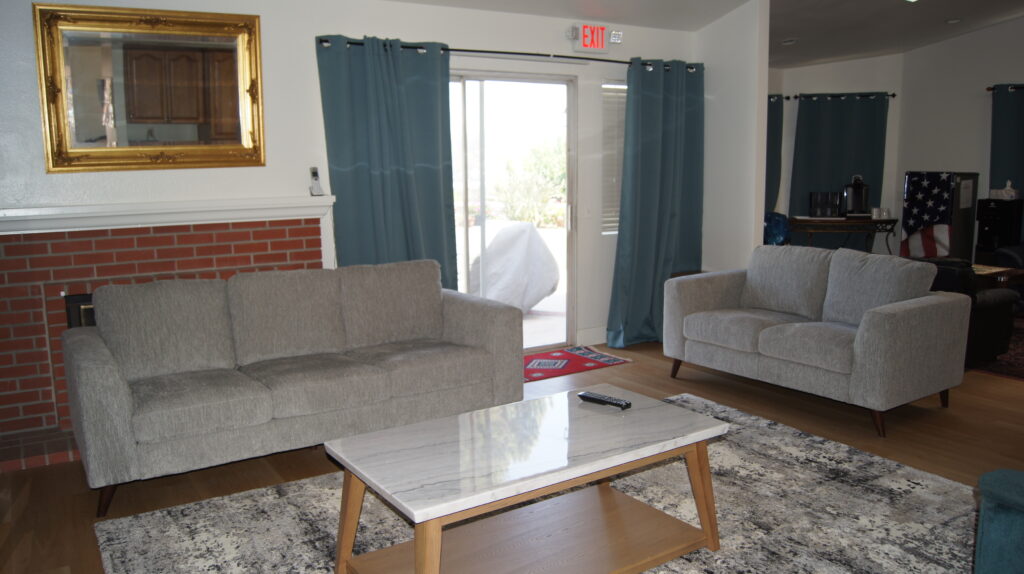 Gray couches and marble coffee table in lounge