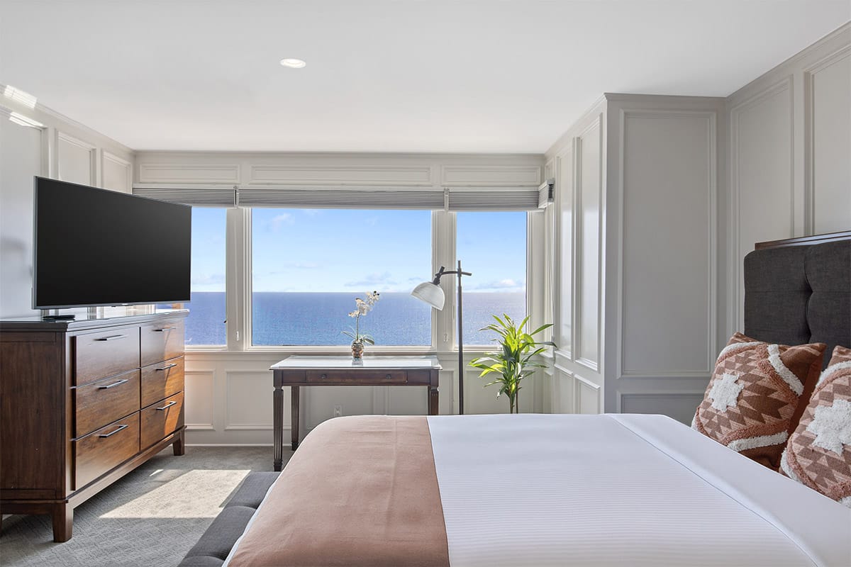 Private bedroom with shared space and ocean-facing windows