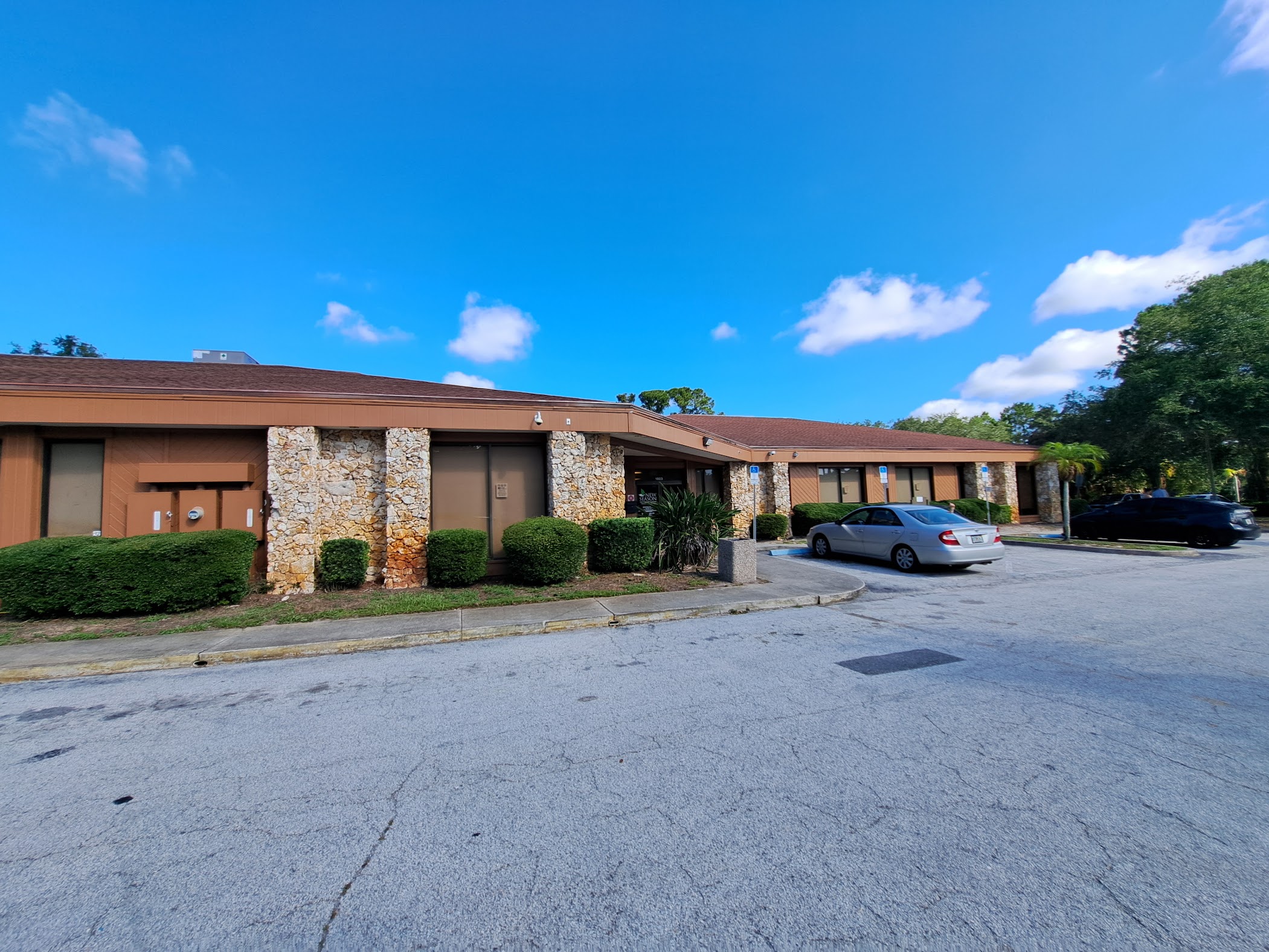 Parking lot with cars outside treatment facility
