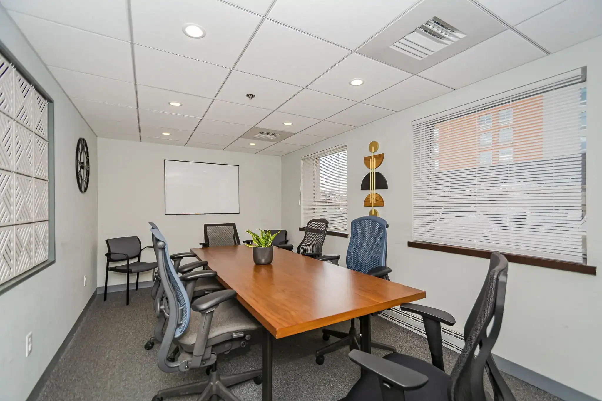 Conference room with table and office chairs