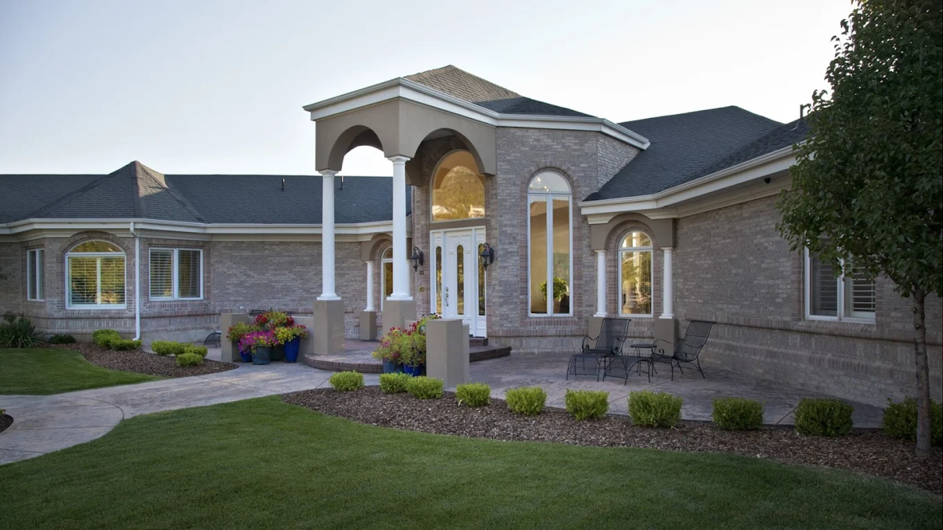 Large residential treatment home with landscaped entry