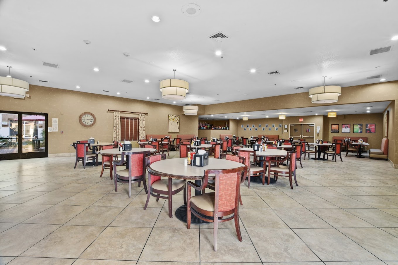 Bright, open dining area with modern lighting and furnishings