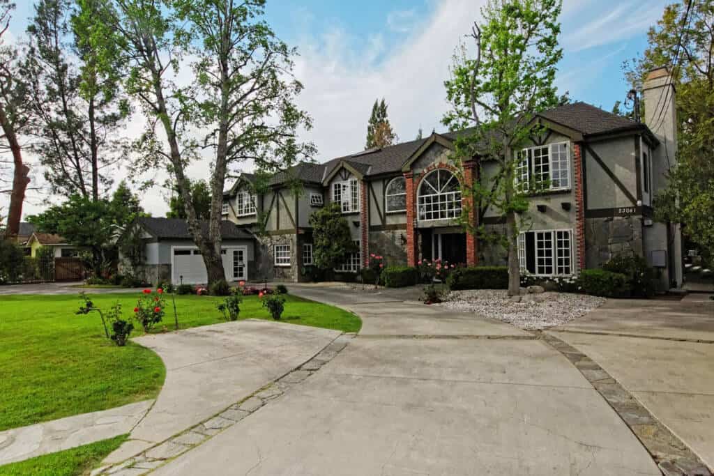 Tudor-style rehab center with circular driveway