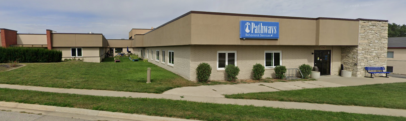 Behavioral health center exterior with side lawn and signage