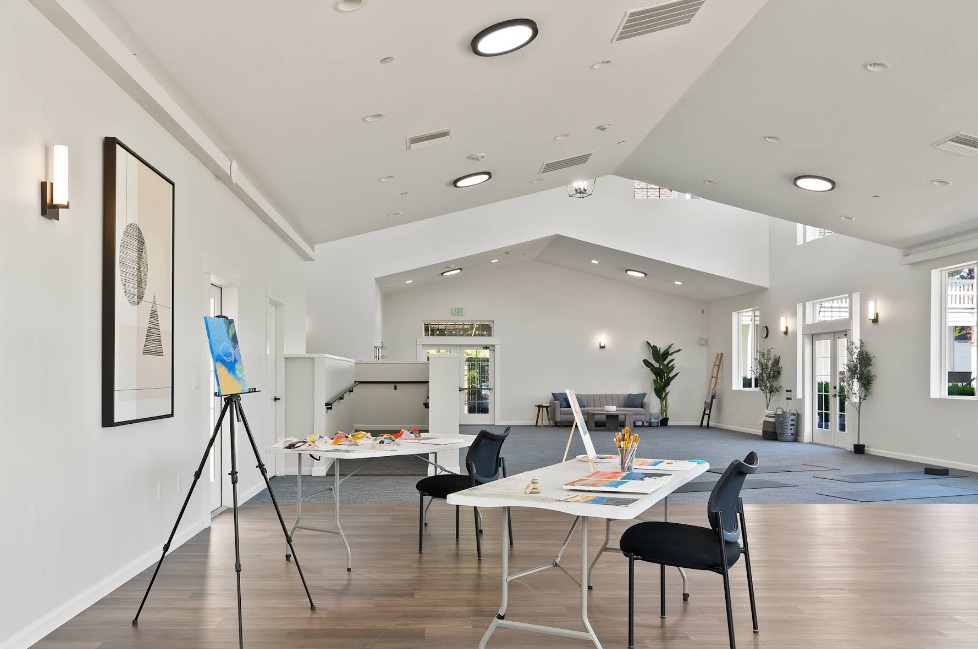 Activity room with art tables and open seating