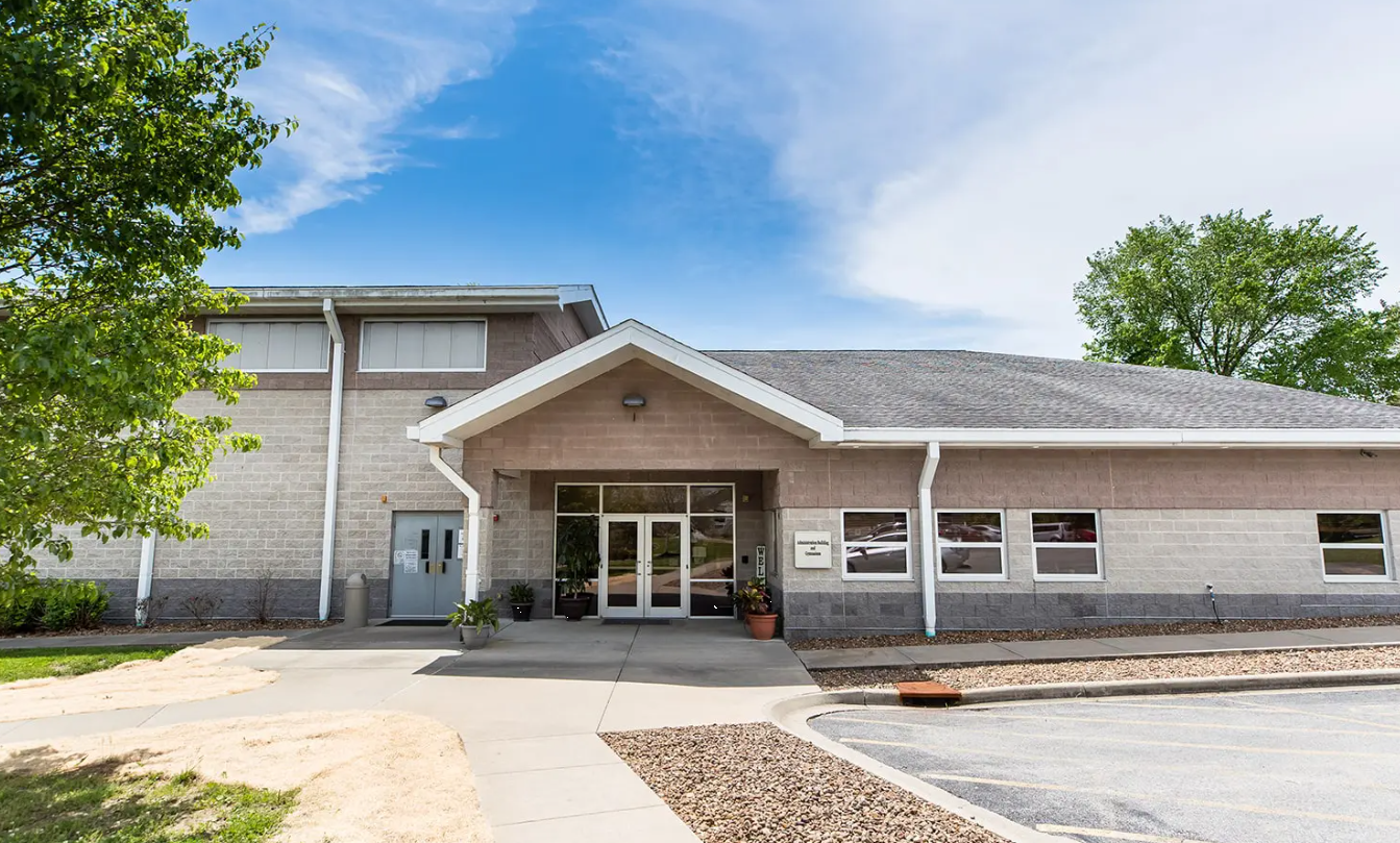 Entrance to Gateway Foundation Carbondale with trees and walkway