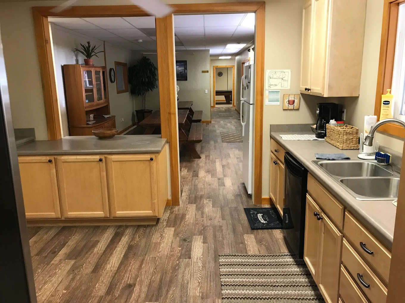 Community kitchen with counters and dining area