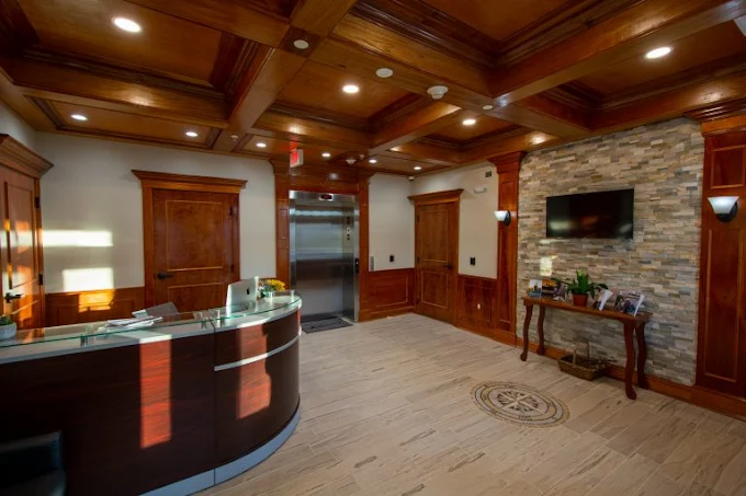 Welcoming lobby with wood accents and reception desk