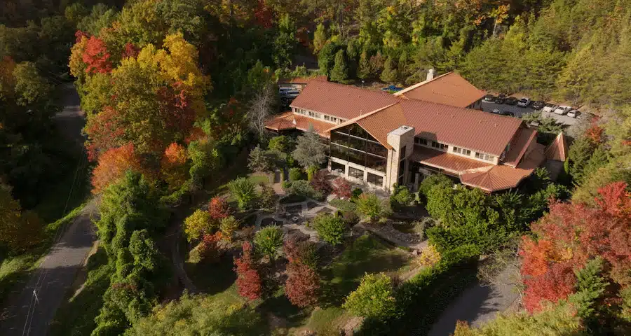 Aerial view of lodge surrounded by Smoky Mountain forest