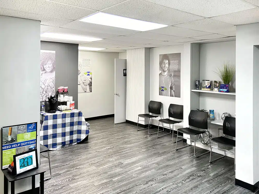 Waiting room with chairs and refreshment table