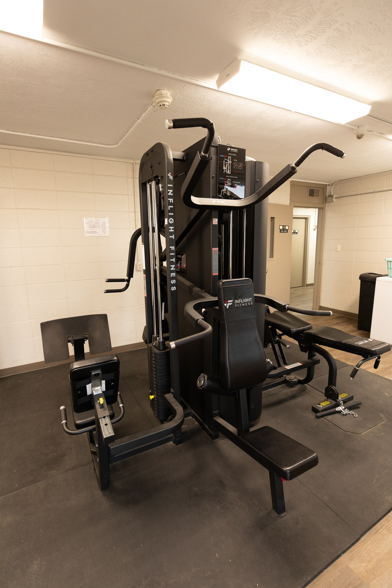 Fitness room with strength training equipment