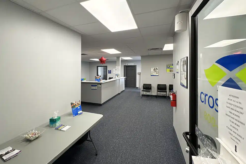Clinic reception area with front desk and seating