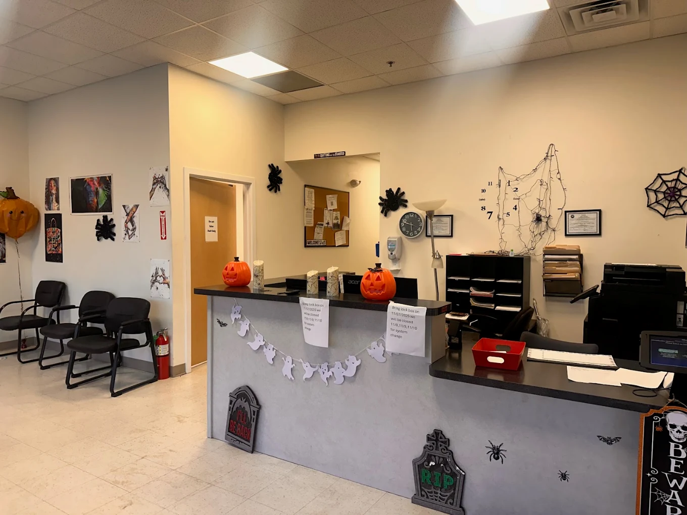 Reception desk with chairs and seasonal decorations