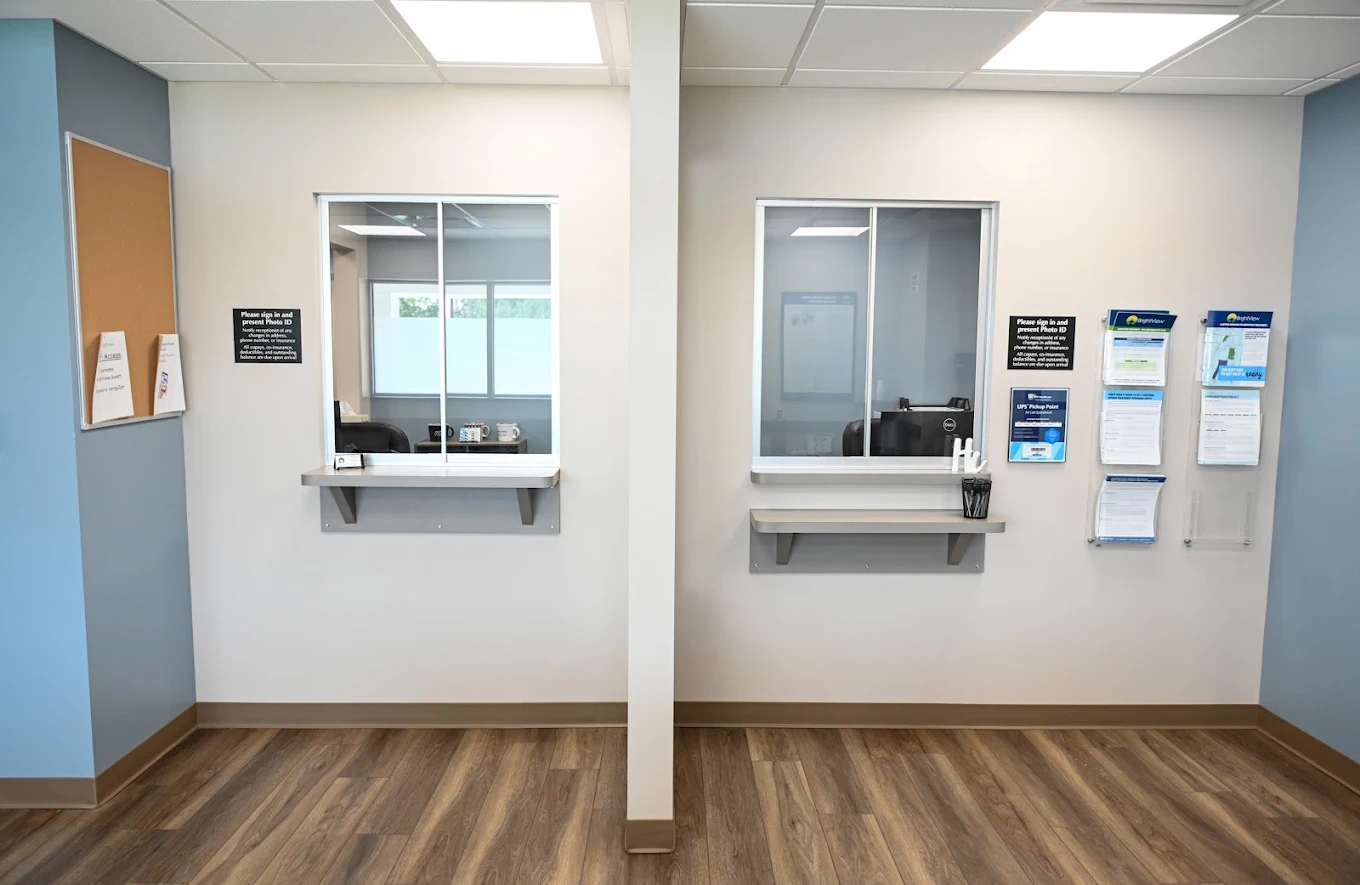 Patient check-in windows and reception area