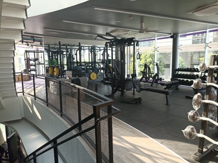 Modern fitness gym with weight and cardio equipment
