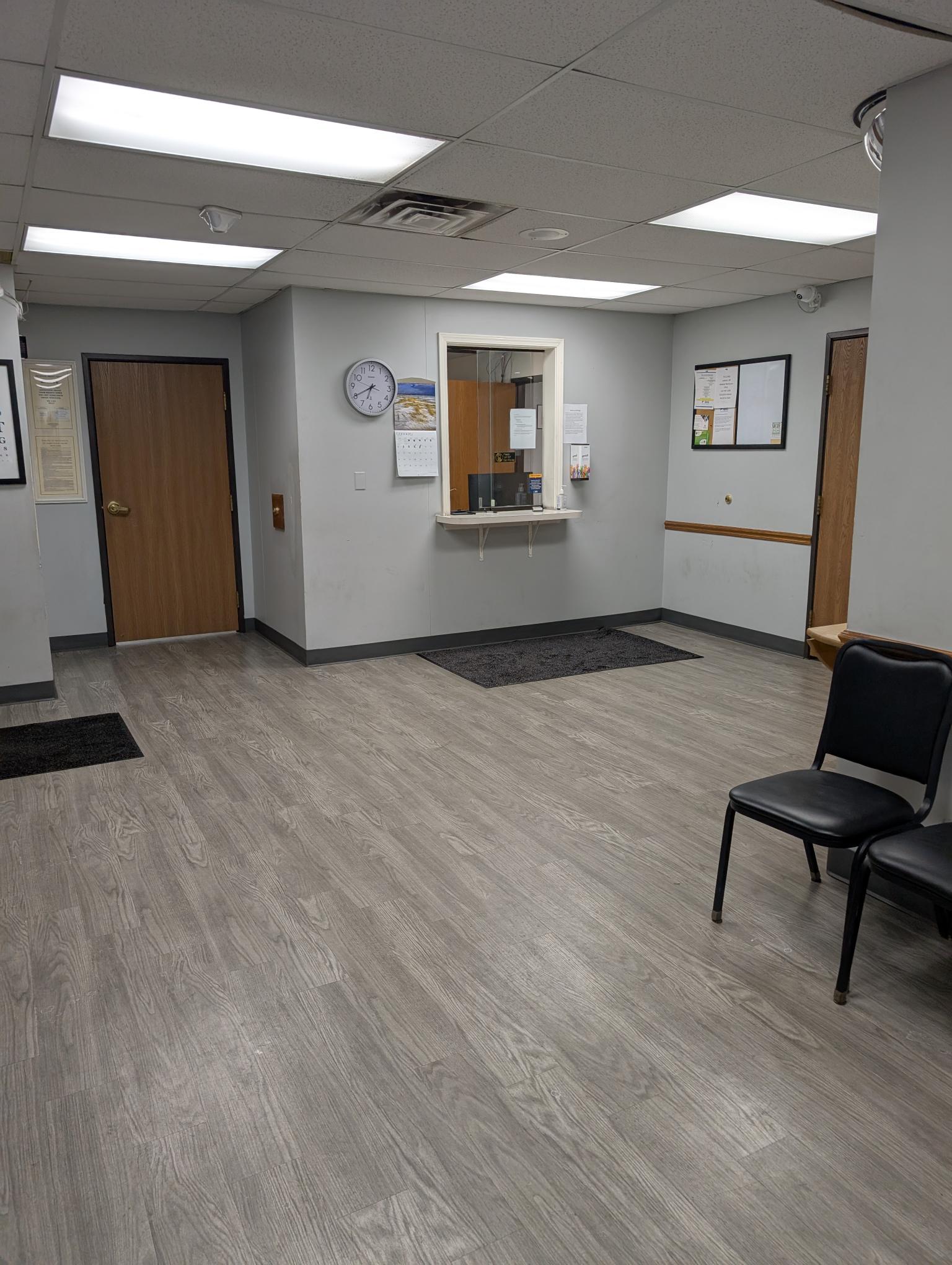 Reception check-in window in the facility lobby