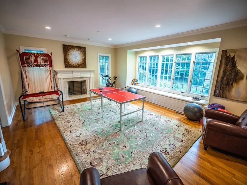 Recreation room with ping pong table and basketball game